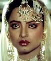 Rekha 20 yrs ago (above) and