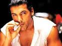 John Abraham Smoking Photos &
