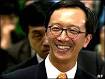 Antony Leung, pictured in the first day of his job as Hong Kong's financial ... - _39285737_leung203body_ap