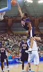 Image Vince Carter Dunks Over A Man Picture