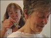 Acupuncturist Karen Proudfoot busy at work - _41068447_karenproudfoot_152