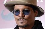 150311-johnny-depp-file_5b69e07ec4542bf90b27bfdfe479e6ba.jpg