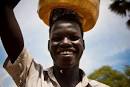 Clean Water Projects: Fixing the Cycle of “Break-Down & Repair” - jason_seagle_-_south_sudan_-_man_carrying_water_on_head