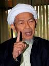 Nik Abdul Aziz Nik Mat/ Photo by Bernama Hakcipta Terpelihara - images?q=tbn:ANd9GcR3daX8TDpuxEGFCtg3NG6IM9v3CAZBgavViXdcxJjDiRWe3FsyzuaxIALp