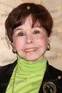 Neile Adams McQueen arriving