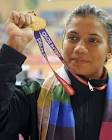 Gagan Narang, left, and Hasan Imran Khan smile with the gold medals they won ... - 2