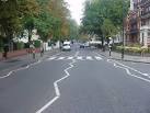 The crosswalk (zebra crossing) where the Beatles Album photo was taken. - via Daymix