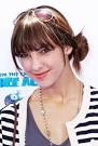 Denyse Tontz sports bangs with side knot Denyse Tontz: Side bun hairstyle - Denyse-Tontz-sports-bangs-with-side-knot