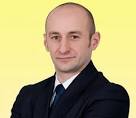 judeţean Adrian Maxim a