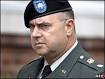 War Criminal : The only US officer charged in Abu Graib scandal cleared of