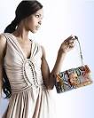 http://www.gifthandbags.com/wp-content/uploads/2009/07/fendi-multi-coloured-python-baguette-bag.jpg