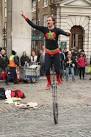A Covent Garden street entertainer dressed as a superhero successfully - via Daymix