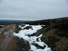 NH7840 : Snow Melt coming Off Beinn Bhuidhe Mhor. 4 km from Castletown, - via Daymix