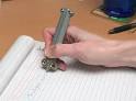 ThinkGeek :: Butterfly Knife-Styled Pen