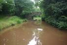 The heavy rain over the previous 48 hours has turned the canal a muddy - via Daymix