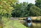 Narrow boat passing over Red Bull aqueduct - via Daymix
