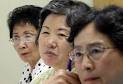 ... Young Hec Kim and Judy Choi, listen during a planning meeting in July at ... - 9894743-large