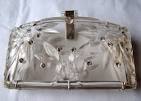 http://www.propervintageclothing.com/images/accessories/purses/50s-lucite.jpg