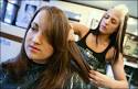 Erica Skov (left) receives a haircut from senior stylist Nina Tarallo at ... - 1191155246_7120