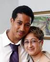 Proud moment: Tracey Simmons-Burgess hugs her son Jaret Simmons after he was