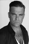 Photo Gallery: <b>Robbie Williams</b> tells Q