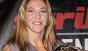 Cris Santos | MMAWeekly. - Cris-Cyborg-with-Belt-460x270