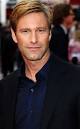http://images.wikia.com/batman/images/d/d4/AaronEckhart.jpg
