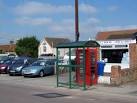 K6 telephone box in front of the Full House Fish and Chip shop. - via Daymix