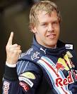 One to watch: Sebastian Vettel celebrates after he clocked the fastest time ... - article-1194348-056B2B72000005DC-279_468x576