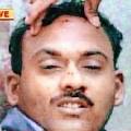 A television image of the body of Shahnawaz Khan alias `Gazi Baba'. — PTI - 2003083104810101