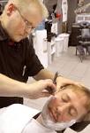 ... left shaves the face of massage Therapist Tim Hoyt at the Strategic ... - movember-892d8e72978904c2