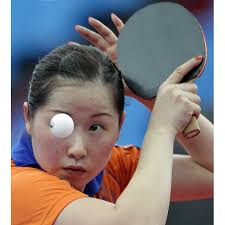 Li Jie of the Netherlands serves during her table tennis match against Iveta Vacenovska of the Czech Republic. Picture: EPA - Li-Jie-eye_1645757i
