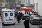 Manhunt for gunmen in Paris after twelve killed in massacre at.