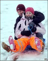 Graham Eales from Brecon and his daughter Caitlin, 25, enjoy the snow on the. Graham Eales and daughter Caitlin, 25, enjoy the snow in the Brecon Beacons - _47010888_breconsnow282pa