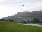View along Prince Charles Way looking towards Cavehill. - via Daymix