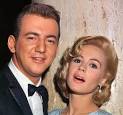 across like Sandra Dee.