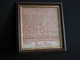 This sampler showing the Eaton family registry from 1817 to 1860 was stitched by 12 year old Cora Eaton in 1872. - 198414101