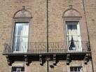 Two large windows, bearing the date 1605 on the lintels. - via Daymix