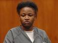 Jasmine White enters courtroom