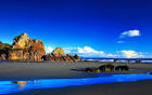 Rocky beach under Deep blue sky tranquil beach Wallpaper 25
