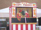 Punch and Judy show, Omagh. Mr Punch gets a battering - Link - via Daymix