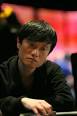 Wang Qiang moved all in preflop from the big blind after Sam Trickett made ... - Wang_Qiang_Large_-202x304