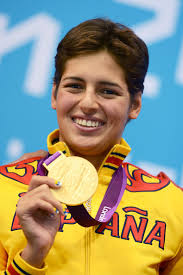 Gold medallist Michelle Alonso Morales of Spain poses on the podium during the medal ceremony for the Women&#39;s 100m Breaststroke - SB14 final ... - Michelle%2BAlonso%2BMorales%2B2012%2BLondon%2BParalympics%2Bqzgz5onu-1gl