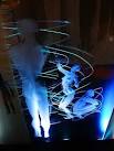 Images of human figures, have been etched by the artist onto glass panels - via Daymix