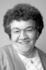 she was a daughter of the late Charles V. and Annie Caslow Brenneman,
