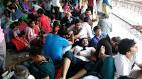 LIVE: Mumbai hit by torrential rains, train services on main line.