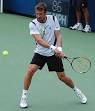 http://upload.wikimedia.org/wikipedia/commons/thumb/3/37/Juan_Carlos_Ferrero_at_the_2009_US_Open.jpg/220px-Juan_Carlos_Ferrero_at_the_2009_US_Open.jpg