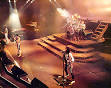 Image Queen in concert, 1984. John Deacon (far left), Freddie Mercury (centre Picture
