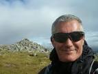 Bruce Sloan at summit of Stob