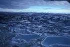 of wetland frozen ponds in - via Daymix